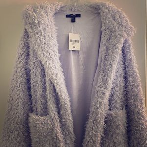 Slightly shaggy fur jacket, never worn with tags.